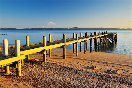Wooden Jetty in Morning, Maraetai, Auckland Region, North Island, New Zealand Stockbilder - Premium RF Lizenzfrei, Bildnummer: 600-07110738