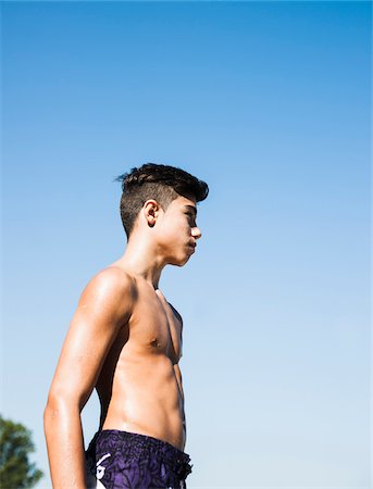 preteens but in bathing suits - Profile of Boy at Lake, Lampertheim, Hesse, Germany Foto de stock - Sin royalties Premium, Código: 600-07148091