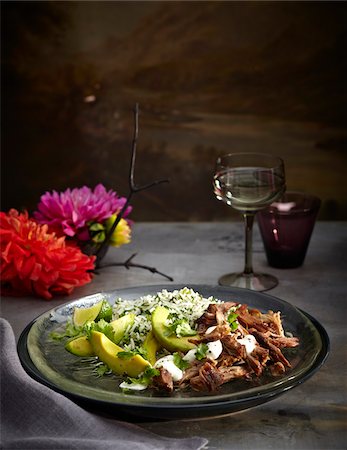 plate red wine glass - Pork carnitas with herb rice on plate, Mexican Fiesta, studio shot Stock Photo - Premium Royalty-Free, Code: 600-07156159