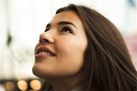 simsearch:600-07434925,k - Close-up portrait of teenage girl looking upward, Germany Foto de stock - Sin royalties Premium, Código: 600-07156194