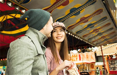 fall outside fun - Young Couple at Amusement Park, Mannheim, Baden-Wurttemberg, Germany Stock Photo - Premium Royalty-Free, Code: 600-07156260