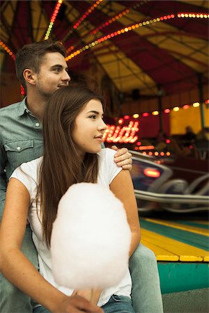 eating outside young - Portrait of Young Couple at Amusement Park, Mannheim, Baden-Wurttermberg, Germany Stock Photo - Premium Royalty-Free, Code: 600-07156277