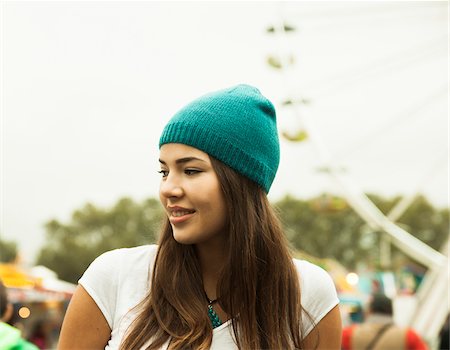 Portrait of Young Woman at Amusement Park, Mannheim, Baden-Wurttermberg, Germany Stock Photo - Premium Royalty-Free, Code: 600-07156279