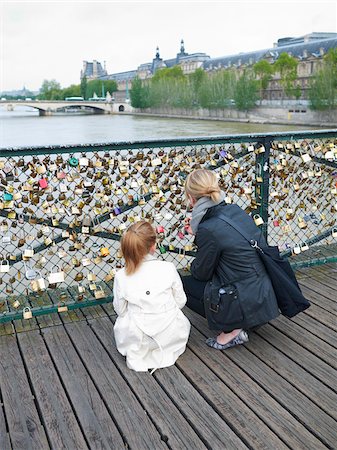 europe landmarks - Mother and Daughter looking at Love Locks on Pont Des Arts, Paris, France Stock Photo - Premium Royalty-Free, Code: 600-07199702