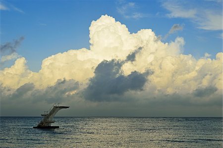 Diving board and storm clouds at Rhodes City beach, Rhodes, Dodecanese, Aegean Sea, Greece, Europe Stock Photo - Premium Royalty-Free, Code: 600-07199964