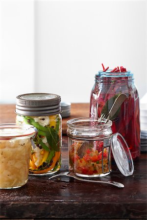 salsa (food) - Multiple Jars of Homemade Pickled Vegetable Relish and Salsa Stock Photo - Premium Royalty-Free, Code: 600-07204037