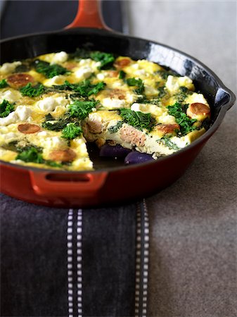 frittata - Sausage and Kale Frittata in Frying Pan, Studio Shot Stock Photo - Premium Royalty-Free, Code: 600-07204042