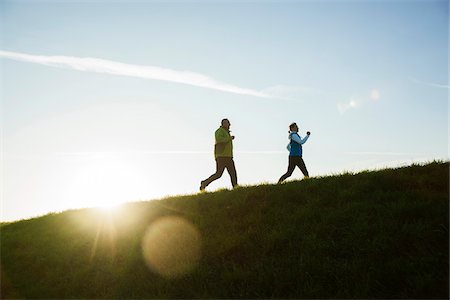 senior citizens jogging - Man and Woman Jogging Outdoors, Baden-Wurttemberg, Germany Stock Photo - Premium Royalty-Free, Code: 600-07236621