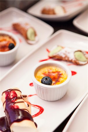 dessert plate garnish - Creme Brulee and Canoli for Dessert at Wedding Stock Photo - Premium Royalty-Free, Code: 600-07237823