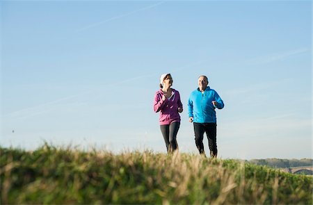 senior man exercising - Couple Jogging Outdoors, Mannheim, Baden-Wurttemberg, Germany Stock Photo - Premium Royalty-Free, Code: 600-07237884