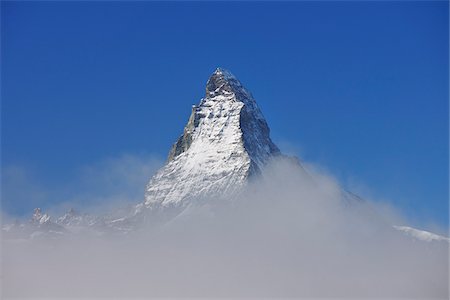 famous places switzerland - Matterhorn in Clouds, Gornergrat, Zermatt, Alps, Valais, Switzerland Stock Photo - Premium Royalty-Free, Code: 600-07278754