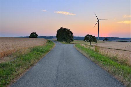 strassengabelung - Countryside with Forked Road and Wind Turbine at Dusk, Bad Mergentheim, Baden-Wurttemberg, Germany Stockbilder - Premium RF Lizenzfrei, Bildnummer: 600-07279168