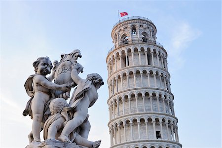 europäisch - Cherub Statue of Fontana Dei Putti with Leaning Tower of Pisa, Piazza dei Miracoli, Pisa, Tuscany, Italy Stockbilder - Premium RF Lizenzfrei, Bildnummer: 600-07288054