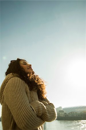 simsearch:600-06355199,k - Close-up portrait of teenage girl outdoors, standing at waterfront, Germany Stock Photo - Premium Royalty-Free, Code: 600-07311101