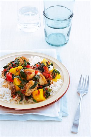 simsearch:600-07278858,k - Spicy Chicken with Mango on Rice, Studio Shot Stock Photo - Premium Royalty-Free, Code: 600-07311284