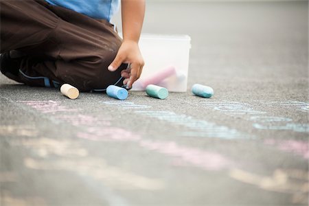 sidewalk - Boy Drawing on Sidewalk with Chalk Stock Photo - Premium Royalty-Free, Code: 600-07311573