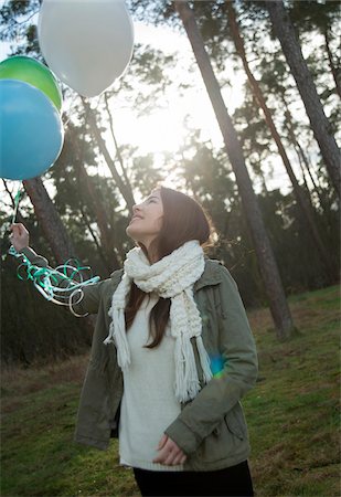 Young Woman with Balloons Outdoors, Mannheim, Baden-Wurttemberg, Germany Photographie de stock - Premium Libres de Droits, Code: 600-07368561