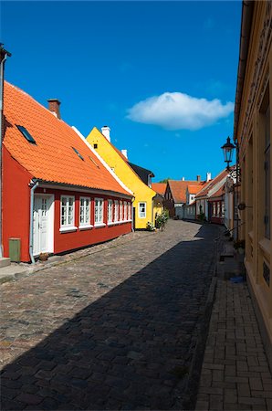 denmark traditional house - Typical painted houses and Cobblestone Street, Aeroskobing Village, Aero Island, Jutland Peninsula, Region Syddanmark, Denmark, Europe Stock Photo - Premium Royalty-Free, Code: 600-07451020