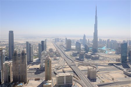 Aerial View of Traffic Junction of Sheikh Zayed Road with Burj Khalifa Skyscraper, Dubai, United Arab Emirates, Middle East, Gulf Countries. Stock Photo - Premium Royalty-Free, Code: 600-07453823