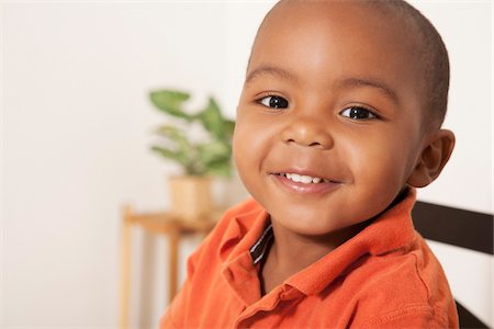 Portrait of Boy Smiling Stock Photo - Premium Royalty-Free, Code: 600-07529172