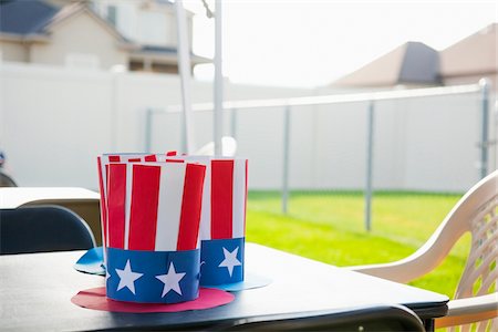 Close-up of American, patriotic paper hats on table outdoors, Independence Day, USA Stock Photo - Premium Royalty-Free, Code: 600-07540311