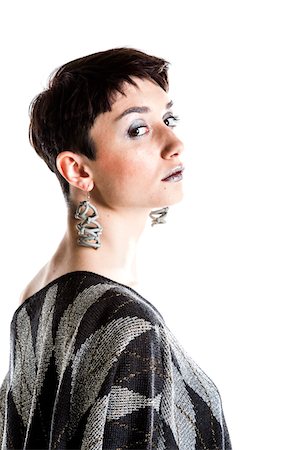 stylish accessories - Portrait of Young Woman wearing Modern Jewellery, Studio Shot Stock Photo - Premium Royalty-Free, Code: 600-07596036