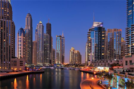 simsearch:600-06841801,k - Skyscrapers at Dubai Marina illuminated at Dusk. Dubai, United Arab Emirates Stock Photo - Premium Royalty-Free, Code: 600-07653875
