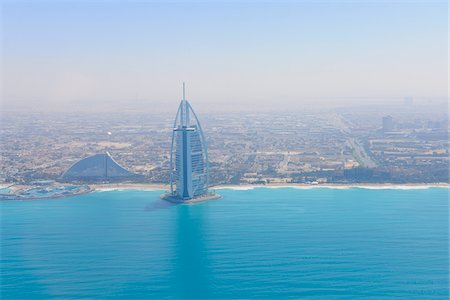 Aerial View of Burj Al Arab and Jumeirah Beach Hotel, Dubai, United Arab Emirates Stock Photo - Premium Royalty-Free, Code: 600-07653879