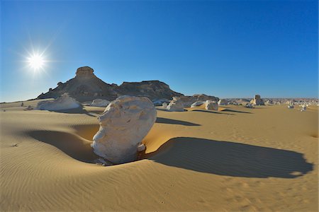 Sun over Rock Formations in White Desert, Libyan Desert, Sahara Desert, New Valley Governorate, Egypt Stock Photo - Premium Royalty-Free, Code: 600-07689527