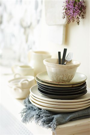 simsearch:600-07311291,k - Close-up of Stack of Dishes on Sideboard in Dining Room Stock Photo - Premium Royalty-Free, Code: 600-07784439