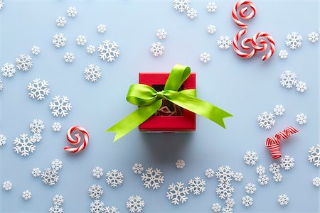 ribbon (material) - Overhead View of Present with Snowflakes and Candy Cane Swirls, Studio Shot Stock Photo - Premium Royalty-Free, Code: 600-07783958