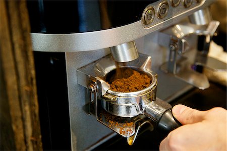 simsearch:649-06622991,k - Automated Coffee Grinder Filling Portafilter Basket in Coffee Shop Stock Photo - Premium Royalty-Free, Code: 600-07802975