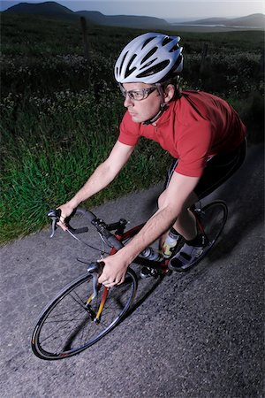 Male triathelete on bicycle training and cycling near Point Reyes, California, USA Stock Photo - Premium Royalty-Free, Code: 600-07945068
