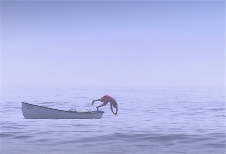 equilibrio - Lifeguard taking a swim break on a hot and foggy day at Easton's Beach in Newport, Rhode Island, USA. Foto de stock - Sin royalties Premium, Código: 600-07945094