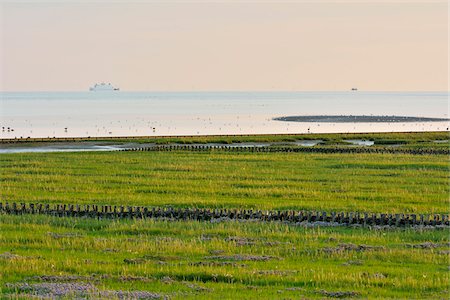 east frisia - Marshland with North Sea and Ships at sunset, Norderney, East Frisia Island, North Sea, Lower Saxony, Germany Stock Photo - Premium Royalty-Free, Code: 600-07945257