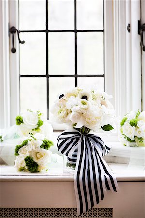flower windowsill - Close-up of Bridal bouquets with stripped ribbon, ready on window sill for Wedding, Canada Stock Photo - Premium Royalty-Free, Code: 600-07966165