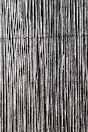 Close-up of Fence made from Thin Wooden Sticks, Royan, Charente-Maritime, France Stock Photo - Premium Royalty-Free, Code: 600-07966211