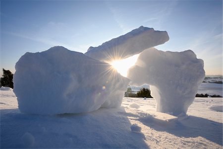 Sun through Broken Ice on Meadow in Winter, Upper Palatinate, Bavaria, Germany Stock Photo - Premium Royalty-Free, Code: 600-07966237