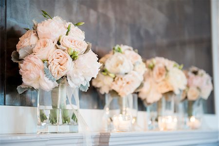 peach color - Bouquets and Candles on Mantle for Wedding Stock Photo - Premium Royalty-Free, Code: 600-07991578