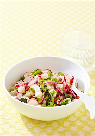 simsearch:600-08002165,k - Scallop Ceviche with radish, purple onion and cilantro, studio shot on yellow background Stockbilder - Premium RF Lizenzfrei, Bildnummer: 600-08002123