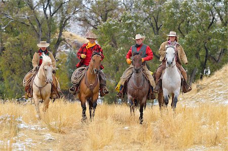 Cowboys and Cowgirls Riding Horses, Rocky Mountains, Wyoming, USA Stock Photo - Premium Royalty-Free, Code: 600-08026194