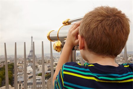 famous place - Boy Looking through Viewer over City to Eiffel Tower from Arc de Triomphe, Paris, France Stock Photo - Premium Royalty-Free, Code: 600-08059869
