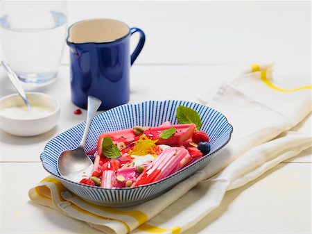 Close-up of Bowl of Rhubarb Dessert with Cream, Studio Shot Stock Photo - Premium Royalty-Free, Code: 600-08060046