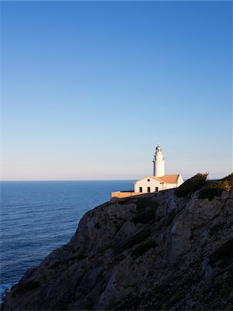 simsearch:600-08102896,k - Lighthouse on Coastal Rock at Sunset, Majorca, Balearic Islands, Spain Stock Photo - Premium Royalty-Free, Code: 600-08102886