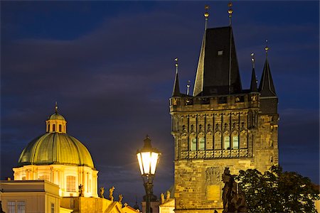 Rooftops of Church of St Francis Seraphinus and the Old Town Bridge Tower at night, Prague, Czech Republic Stock Photo - Premium Royalty-Free, Code: 600-08232155
