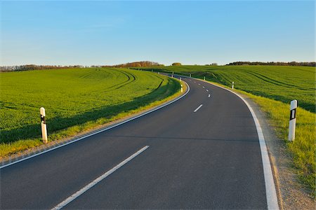 raimund linke - Country Road in Spring, Birkenfeld, Main-Spessart District, Franconia, Bavaria, Germany Foto de stock - Royalty Free Premium, Número: 600-08232275