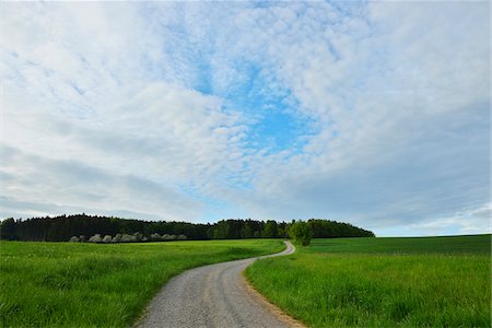 simsearch:600-08386233,k - Winding Gravel Road in Countryside in Spring, Reichartshausen, Amorbach, Odenwald, Bavaria, Germany Stock Photo - Premium Royalty-Free, Code: 600-08232293