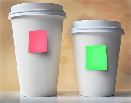 paper cup of coffee - Close-up of Two Take-out Coffee Cups with Sticky Notes Stock Photo - Premium Royalty-Free, Code: 600-08321991