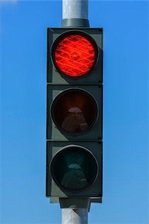 red light (traffic signal) - Red Traffic Light Against Blue Sky, Denmark Stock Photo - Premium Royalty-Free, Code: 600-08519502