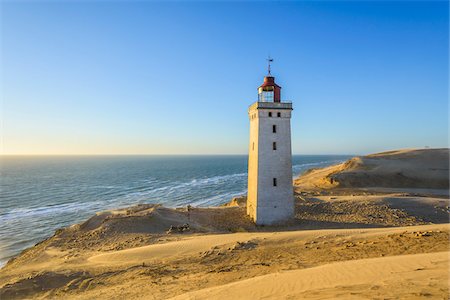 Lighthouse and Dunes, Rubjerg Knude, Lokken, North Jutland, Denmark Photographie de stock - Premium Libres de Droits, Code: 600-08512541